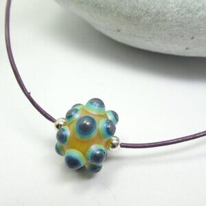 Glass bead on leather necklace